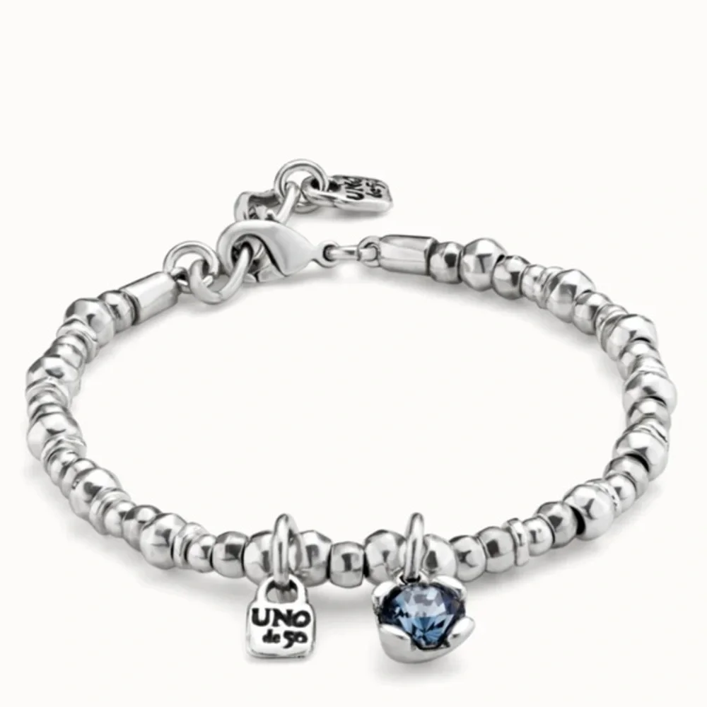 Beaded bracelet with blue crystal